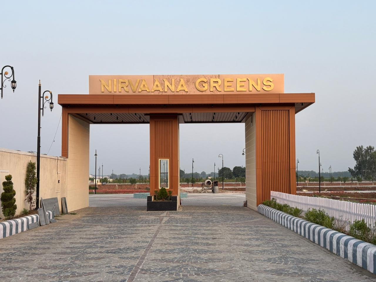Actual entrance gate at Nirvaana Greens residential plots in Haridwar